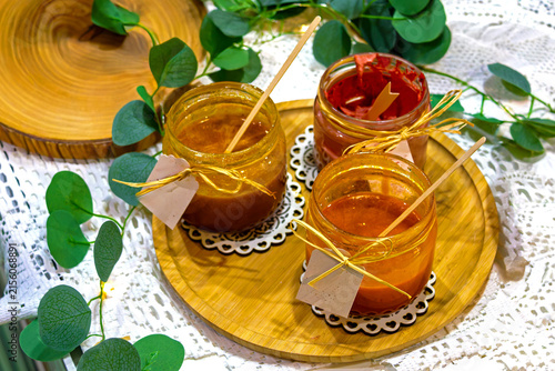 Preserved homemade organic fruit chutney inside glass jars