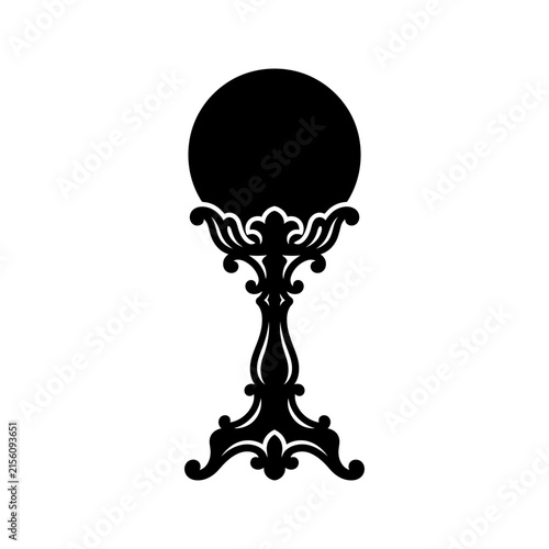 Foto Crystal ball with an ornate stand is depicted as a black silhouette, representing fortune-telling and mystical predictions