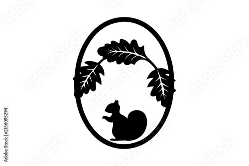 Squirrel silhouette inside oval frame under oak branches for woodland animal nature scene and forest themed decorations.