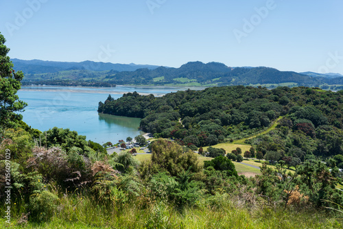 Waihī Beach Coastal Inlet and Forested Hills