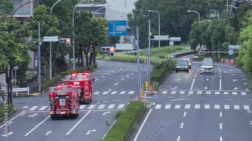 Tokyo,Japan -August 13, 2026:Two fire engines  running in Tokyo in the morning