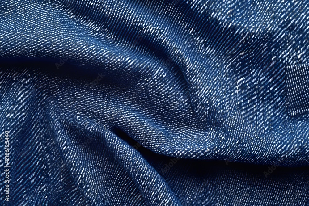 Fototapeta premium Close Up of Blue Denim Fabric Textures Showcasing Detailed Diagonal Cotton Twill Weave Pattern