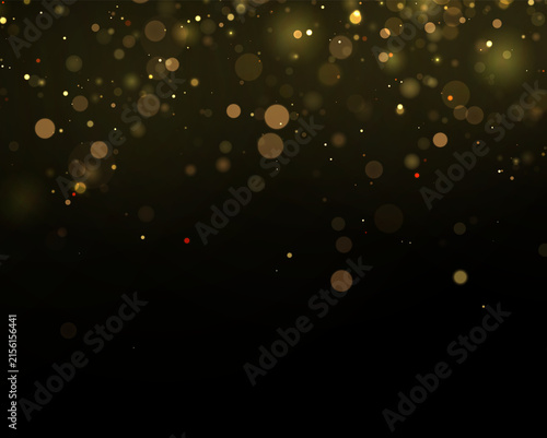 Fotografía Softly glowing gold and amber bokeh lights scattered over a dark background on t