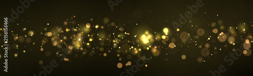 Scattered golden bokeh lights glowing softly on a dark background with varied sizes and warm tones on transparent background