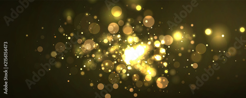 Photography Golden bokeh lights with bright glowing orbs scattered on a dark background on t