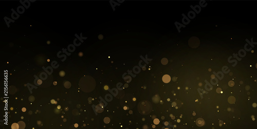 Canvas Print Scattered glowing golden bokeh lights with soft focus on dark background on tran