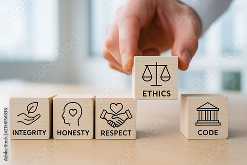 Wooden cubes with line icons representing ethics and corporate values