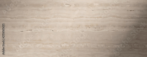 Travertine marble texture background with natural beige and cream stone patterns, abstract architectural surface stock photo