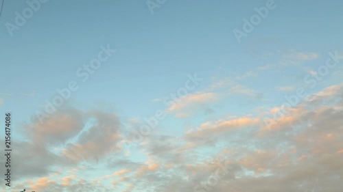 HD quality timelapse video of cloudscape in clear blue evening sky background in sunset evening time. Time lapse