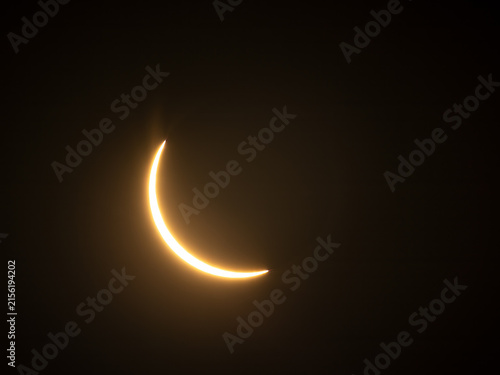 Bright solar crescent during an advanced phase of a solar eclipse.