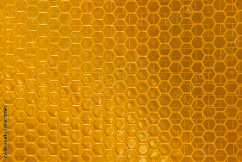 Yellow and Amber Reflective Safety Tape Patterns Close-Up