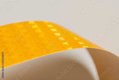 Yellow and Amber Reflective Safety Tape Patterns Close-Up