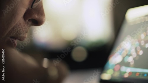 Man Analyzing Data Visualization on Computer Display, Close Up
