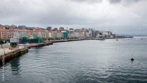 Panoramic view of the Paseo Marítimo and Paseo de Pereda in Santander, Spain, along the waters of the bay on a cloudy summer day