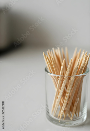 Wooden toothpicks in a clea...