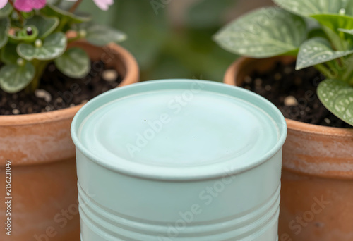 Light blue metal tin with a...