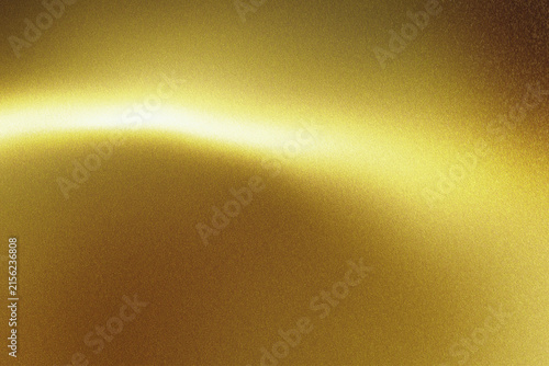 Abstract shiny gold metallic background with smooth light wave reflection and fine glitter texture, perfect luxury backdrop for festive designs, greeting cards, banners