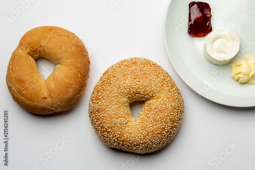 Close-up of bagels with butter and jam
