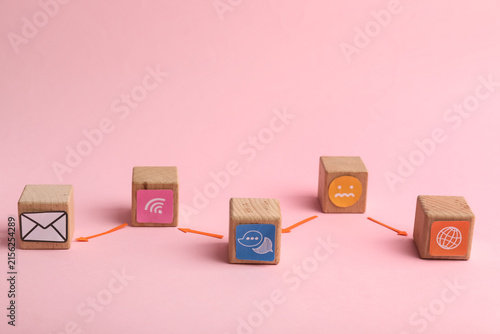 Connected wooden cubes with...