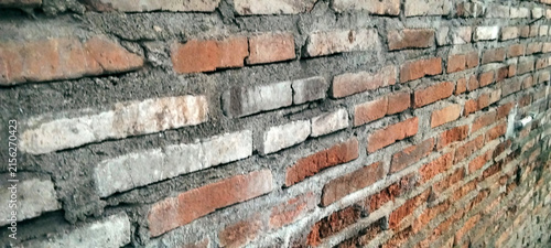 Old brick wall with varied colors.