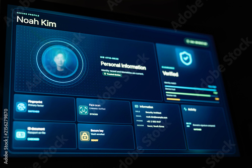 Digital identity verification dashboard with biometric face scan, fingerprint authentication and secure profile data, representing cybersecurity, access control, privacy and online protection.