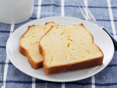 Obraz na plátně Pound Cake Slices with Coffee Cup, Breakfast Table Scene