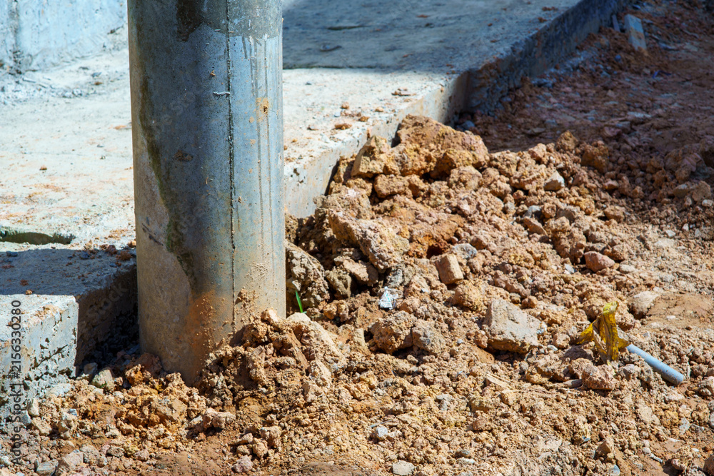 Fototapeta premium Construction site with concrete column and rubble