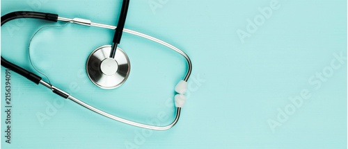 Stethoscope on Teal Background with Copy Space