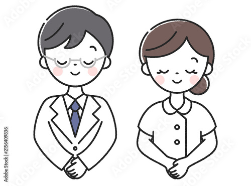 お辞儀をする男性医師と女性看護師