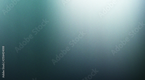 фотографія Deep blue and cool green gradient illuminated by a striking bright light creatin