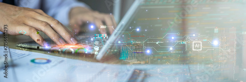 AI technology and software development concept featuring a professional working on a laptop with digital code, data interfaces and AI elements. programming, innovation and digital transformation.