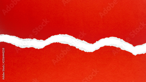Obraz na płótnie Wavy torn red paper slit on transparent background