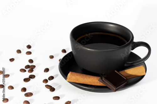 Coffee Cup with Cinnamon Dark Chocolate and Beans in Bright Minimal Still Life