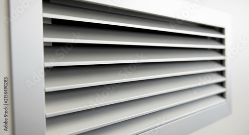 air vents or jalousie grilles with a neatly arranged horizontal blade design for air circulation.