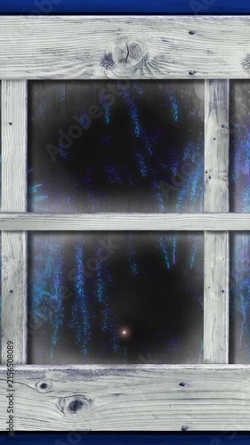 Animation of window with blue christmas and new year fireworks in night sky