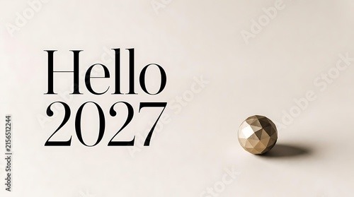 Hello 2027 text with a small metallic sphere on a light background.