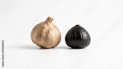Fermented Black Garlic Whole Bulb and Peeled Clove Isolated on White Background. Generative AI