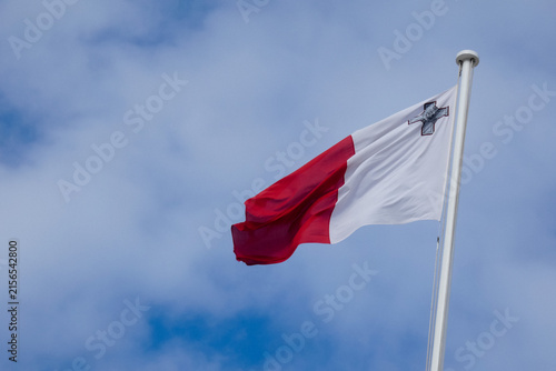 Konstfotografi Maltese flag waving in the wind on a sunny day