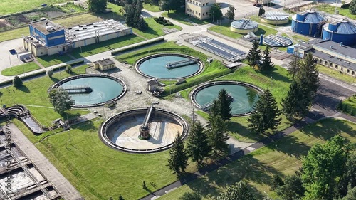 Water management infrastructure with treatment tanks and utility buildings