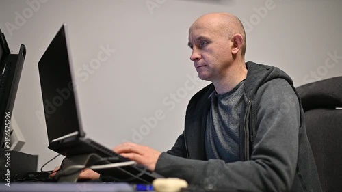 man editing creative content on laptop in cozy workspace at home office Full HD video