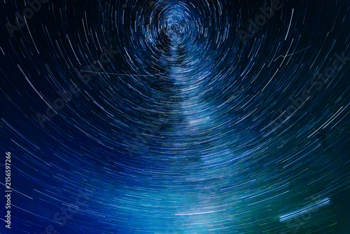 Star trails captured during the Perseid meteor shower, showcasing the Milky Way and celestial movement in a dark night sky