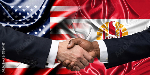 Handshake between the United States and French Polynesia, international friendship, background with flags. Flags.