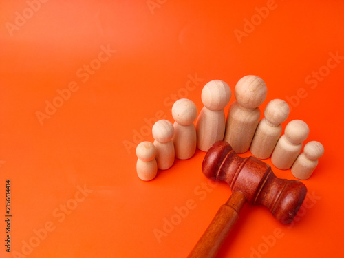 Quadro su tela A wooden gavel lies in front of a semicircular arrangement of seven wooden peg f