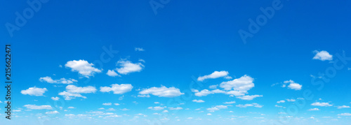 Panoramic fluffy cloud in the blue sky. Sky with cloud on a sunny day.