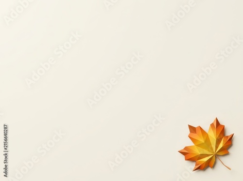 Single low poly autumn leaf on cream background.