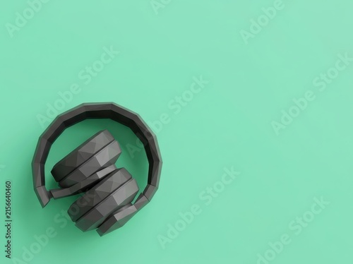 Black low poly headphones on mint green background.