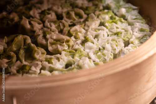 Принти на полотні Steamed shumai dumplings in a bamboo steamer