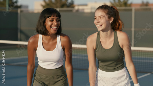 Tennis Players at Sunset