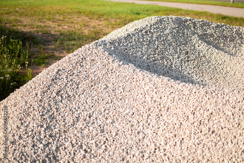 Photography Large pile of crushed limestone gravel, a versatile construction material used f