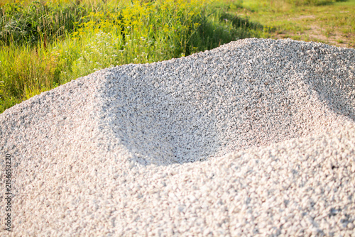 Cuadro en lienzo Large pile of crushed limestone gravel, a versatile construction material used f